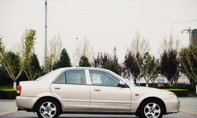 经济适用玩具车-海南马自达323_海马323和马自达323有什么不同
