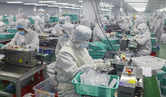 万孚生物招聘(新冠抗原自测放开！厂家招人扩产能，一天接上百个下单电话，工人三班倒)
