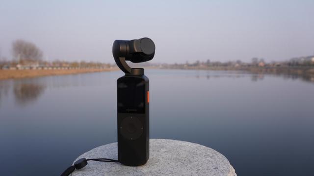 手持移动电视CA卡(手持云台口袋Vlog相机战局激化，抖音强势入局，橙影M1揭秘)
